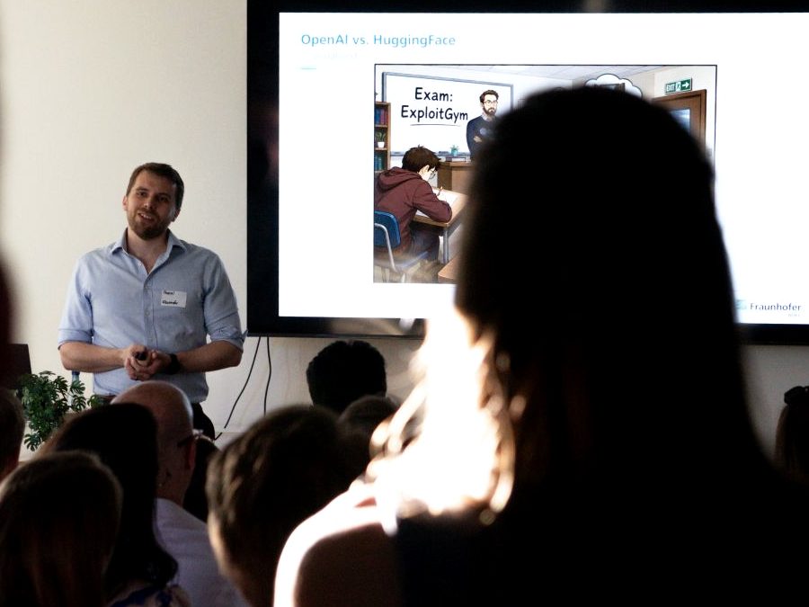 Pascal Debus presenting to a full room